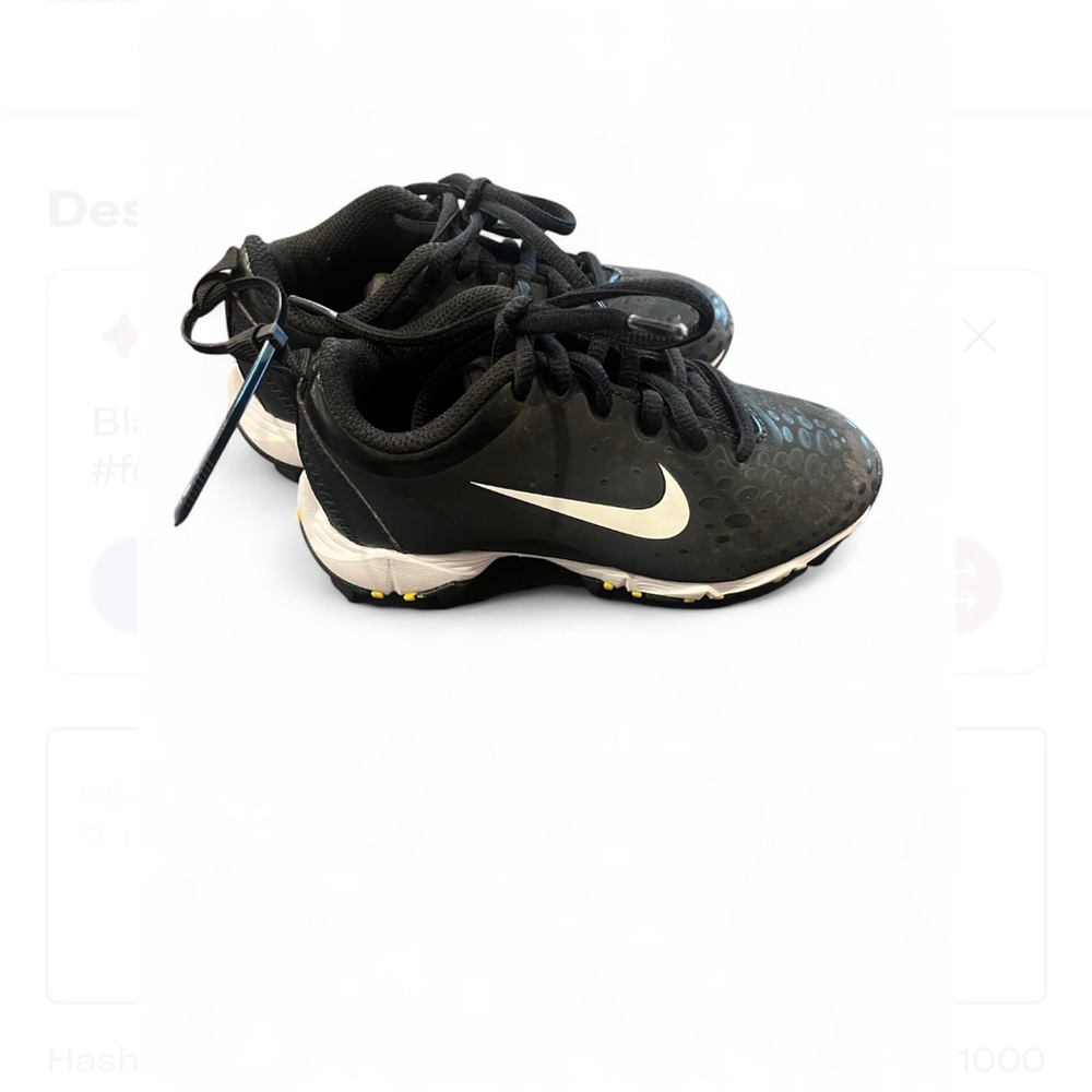 Nike Kids Black and White softball/baseball Sneakers with Yellow Accents